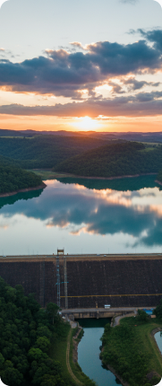 Aerial view of a dam at sunset