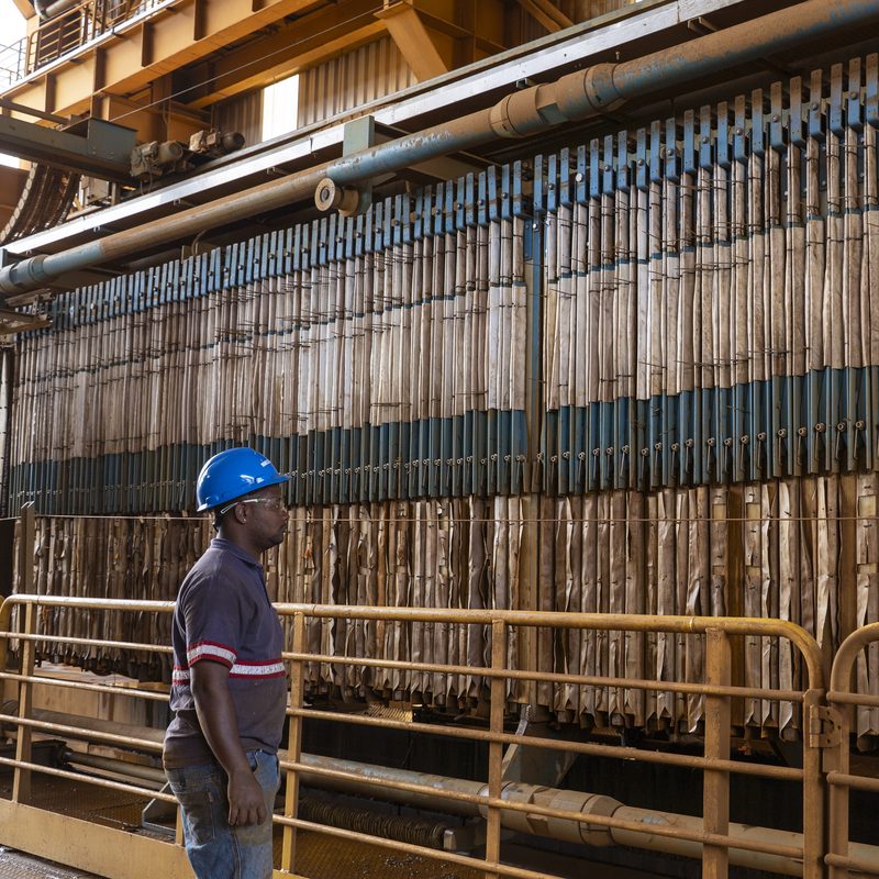 Employee next to the filters at the filtration plant